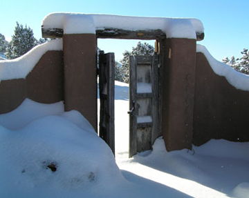 Santa Fe garden gate in snow